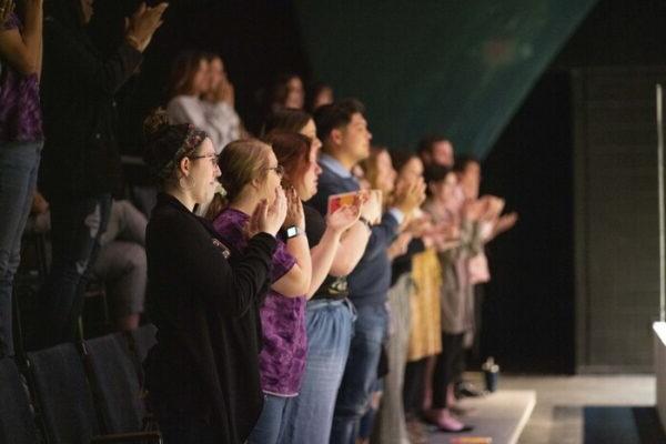 a group of people cheering